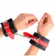 KINK - APPUI-POIGNETS NOIR AVEC CEINTURE ROUGE AJUSTABLE 17-28 CM X 6 CM